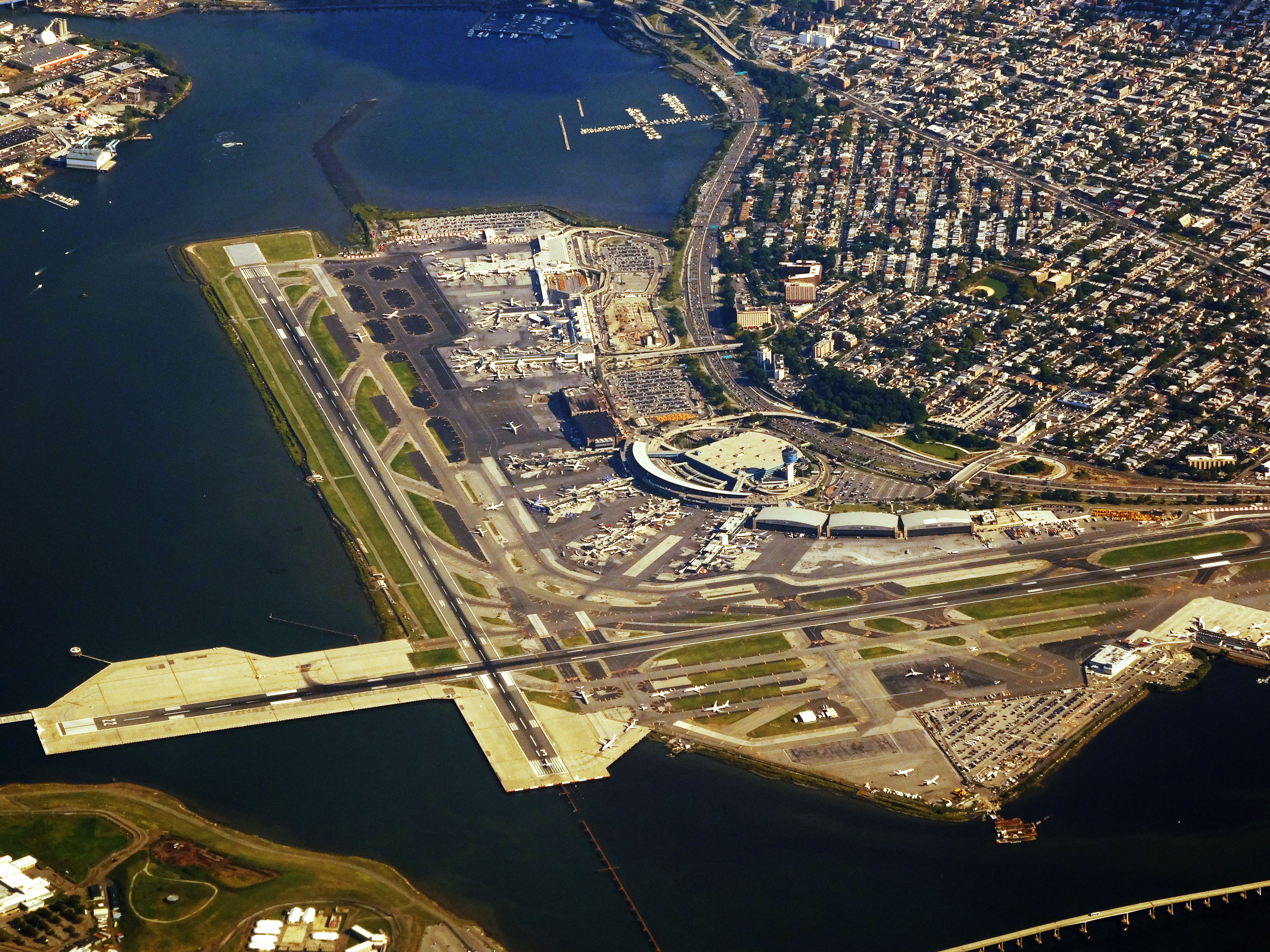 Aerial view of LaGuardia Airport, surrounded by the East River and Flushing Bay