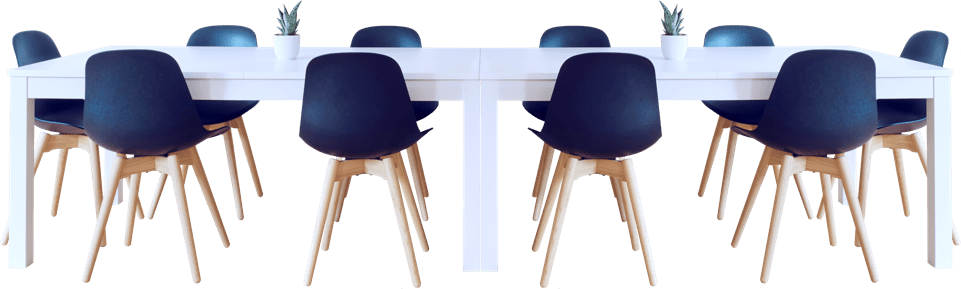 A conference room table with chairs