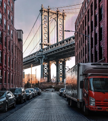 Downtown Brooklyn Bridge between buildings