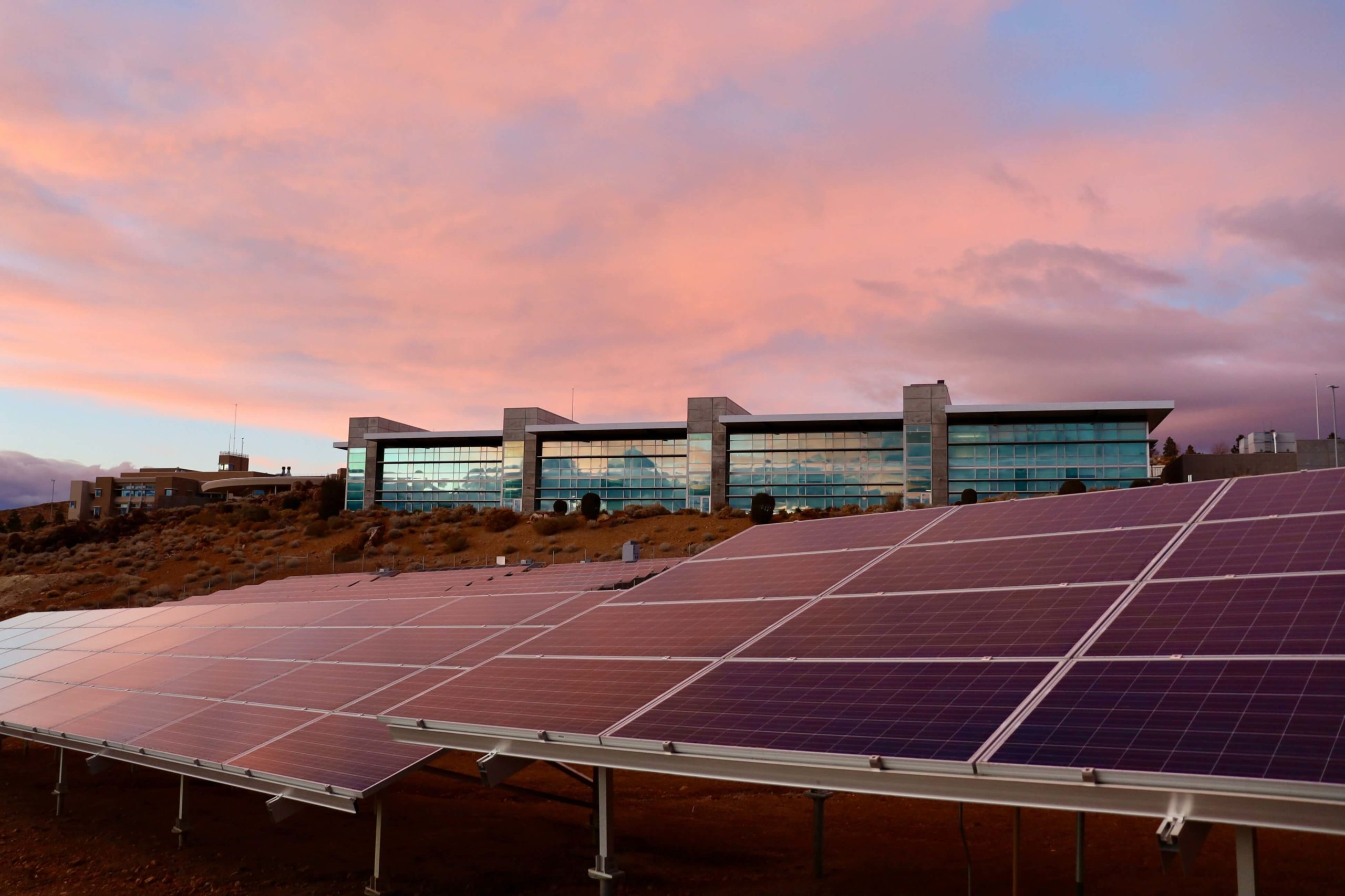 Solar panels used by an office building to harvest energy