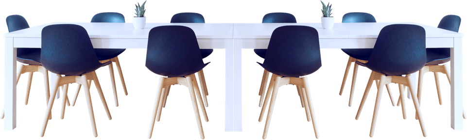 A conference room table with chairs